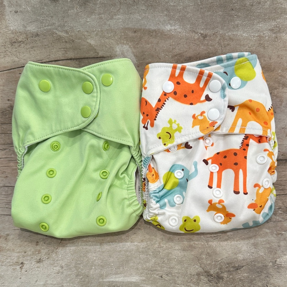 Lalabye Baby, one size cloth diapers reusable. Pair, one print one solid. *USED*